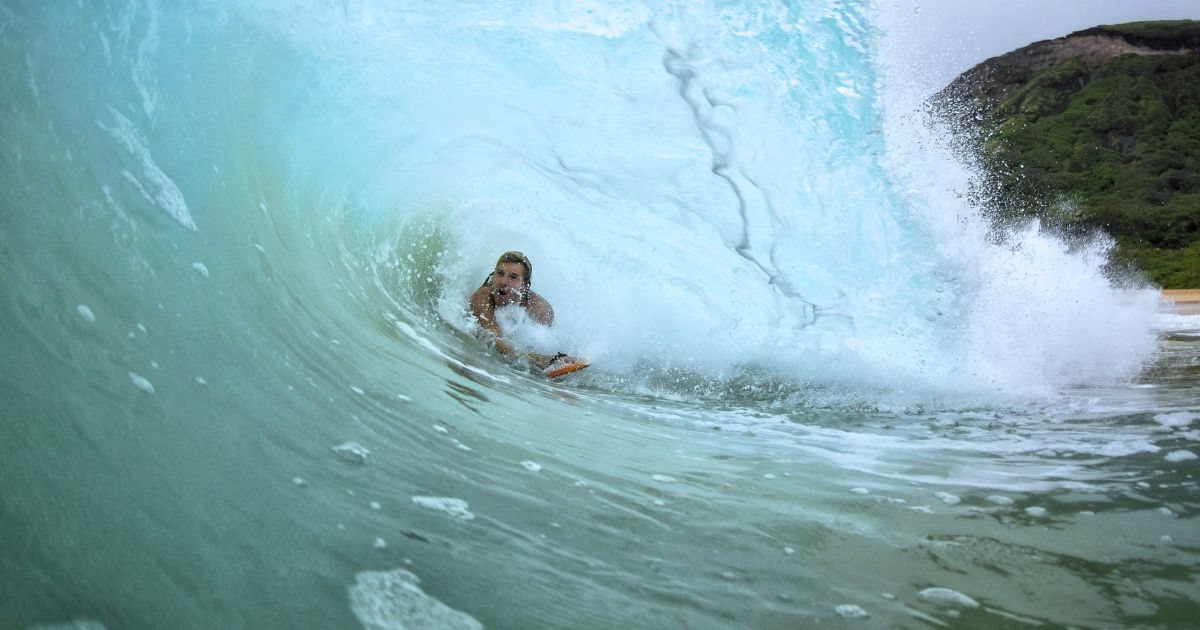 bodysurfing handplane barrel wave